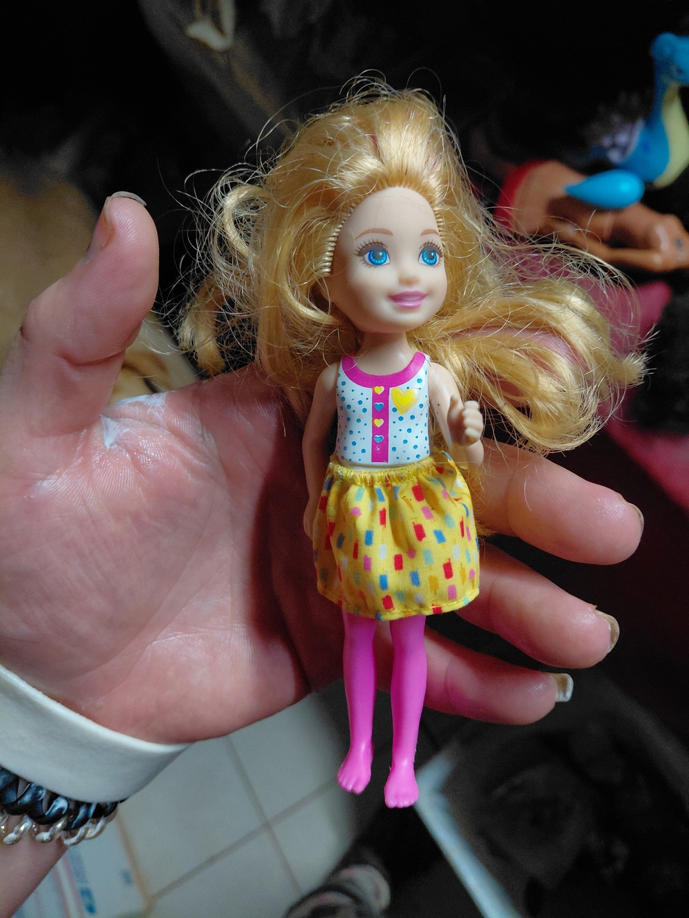 shows a Barbie Club Chelsea Doll with blonde hair,